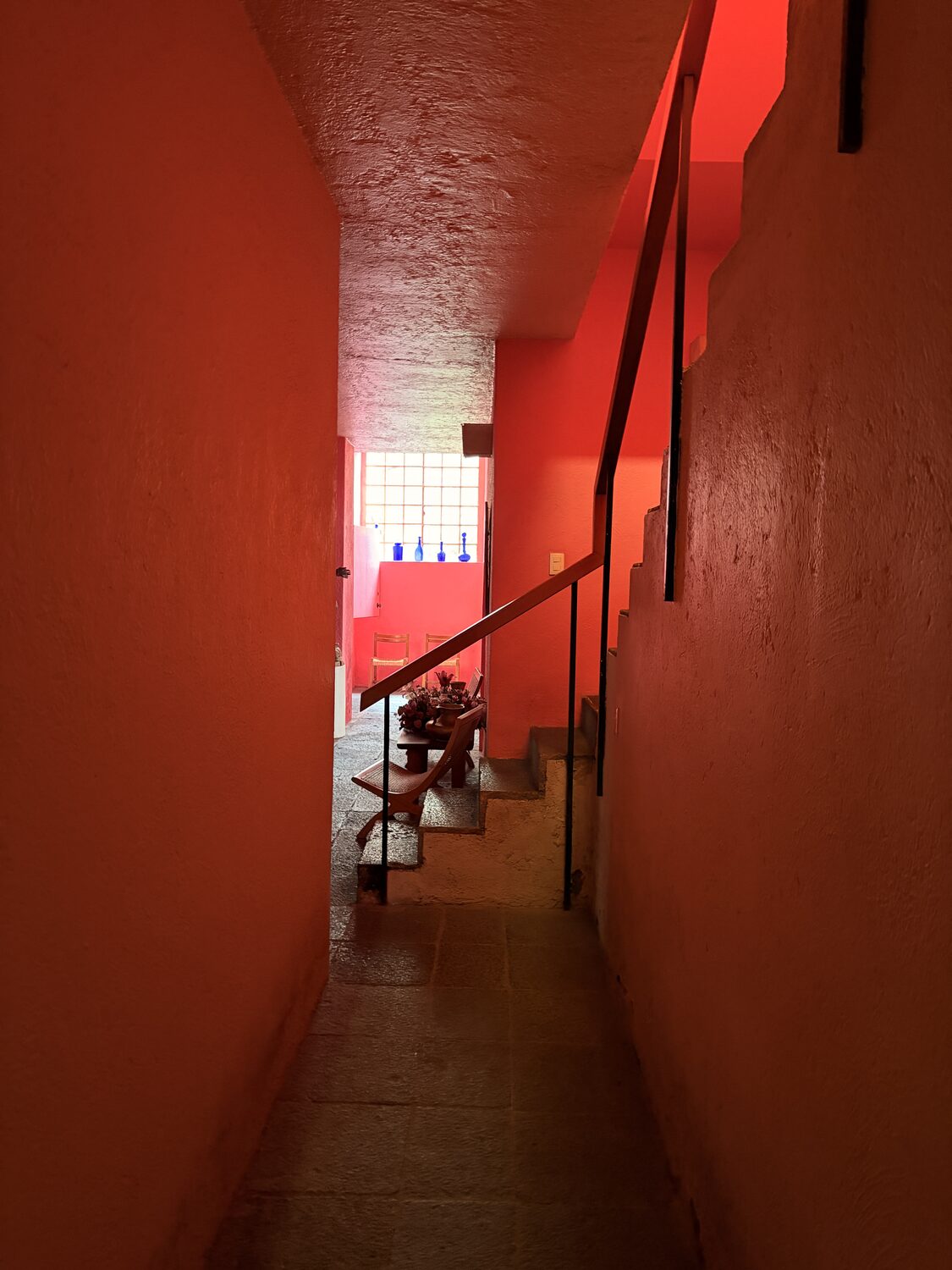 The stairwell, with light coming down from a high window.